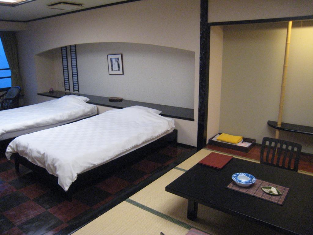 Отель Utsumionsen Ichizu Aichi Экстерьер фото